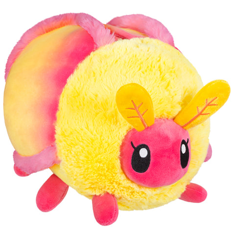 A plush toy resembling a rosy maple moth with yellow body and pink wings, featuring cute facial details.