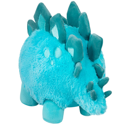 A back view of the plush stegosaurus