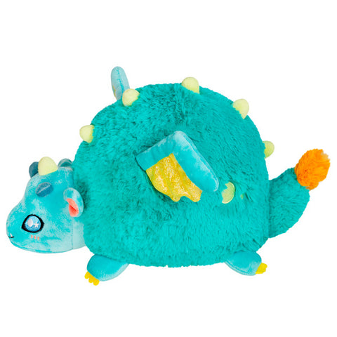 A side view of the plush dragon