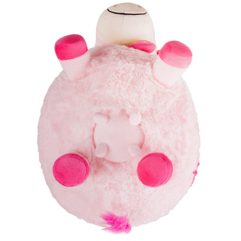 Underside view of the plush strawberry cow. You can see its pink udder.