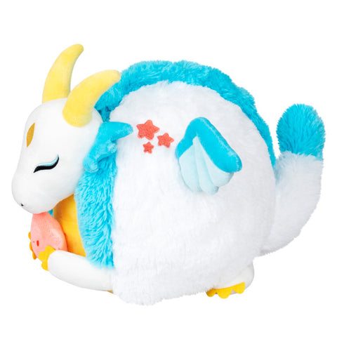 A side view of the plush dragon