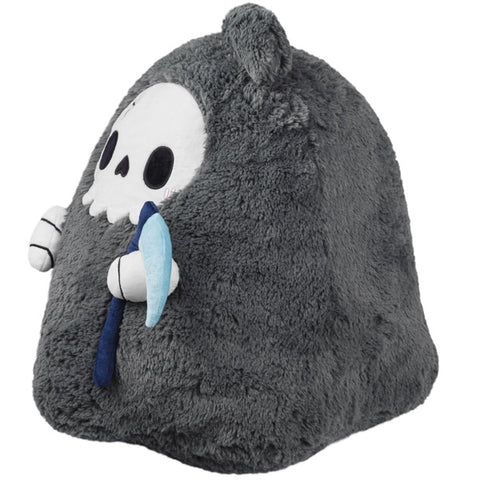 A side view of the plush Reaper on a white background