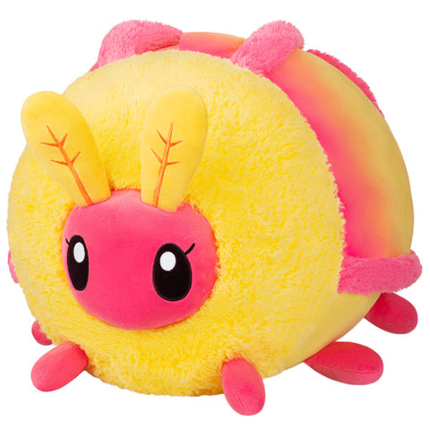 A plush toy resembling a Rosy Maple Moth with yellow and pink colors and a round shape.