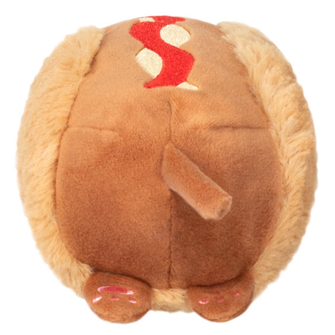 A back view of the plush Dachshund hot dog