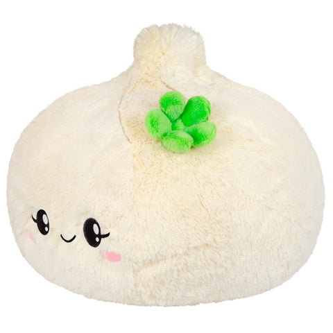A side-angle view of the plush soup dumpling