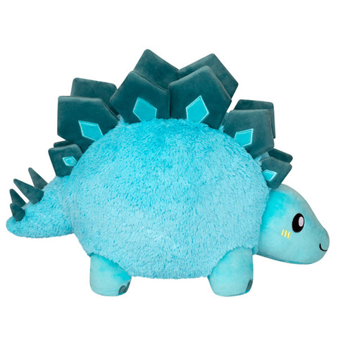 A side view of the plush Stegosaurus