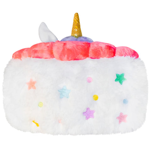 A side view of the plush unicorn cake. It has pastel-colored stars embroidered in.