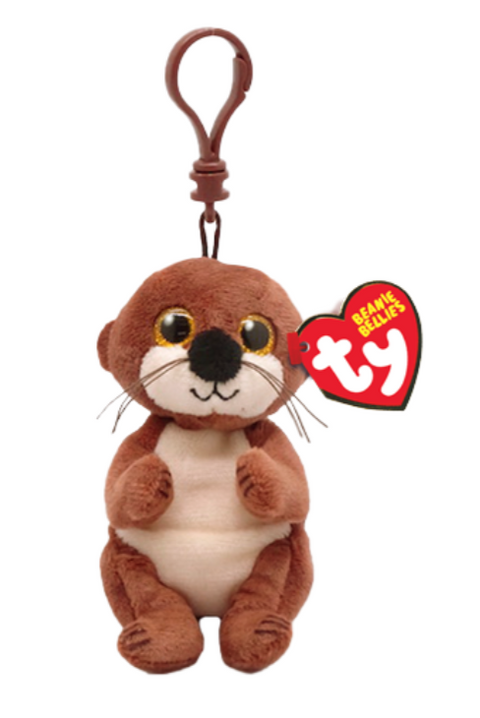Image shows a stuffed otter with large golden eyes hanging from a brown clip