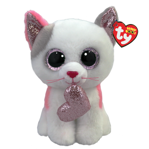 IMage shows a stuffed white cat with pink and purple accents and large purple plastic eyes. Its holding a purple heart in its mouth.