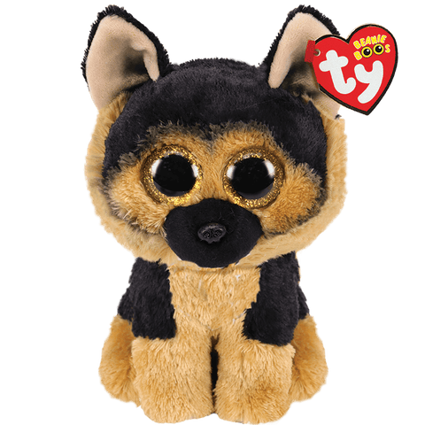 Image shows a stuffed seated German Shepherd Dog with large golden plastic eyes