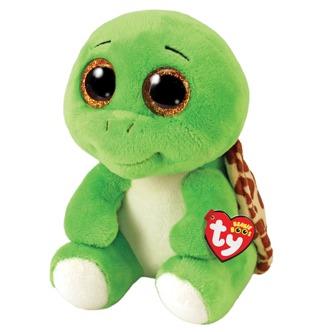 Image shows a stuffed turtle with large golden plastic eyes