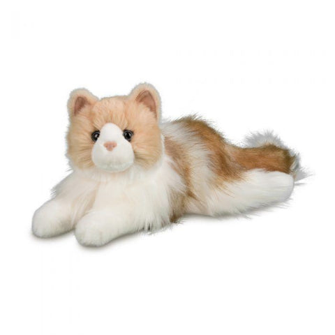 Image shows a stuffed Ragdoll cat. It is tan, brown, and white. It is floppy and laying down.